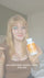 Woman holding a nad+ optimal supplement bottle with text overlay